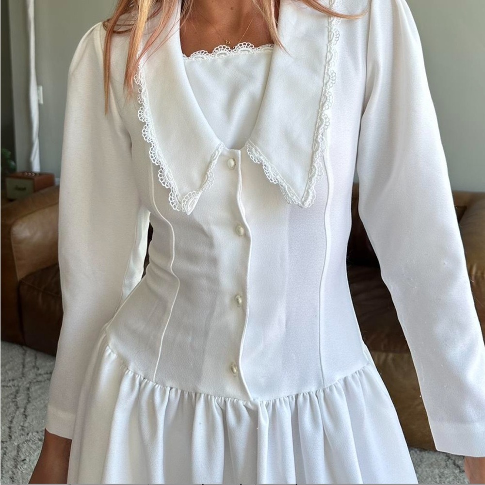 Elegant White Dress with Lace Details